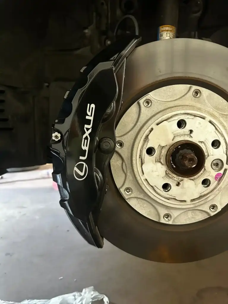 lexus-rx500h-black-caliper-before-paint-lexus-logo-closeup-atlanta